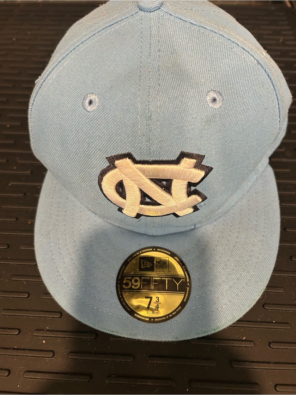 NWT, UNC Tar Heels Carolina Blue 59 Fifty Cap with White Logo - 7 3/4 size